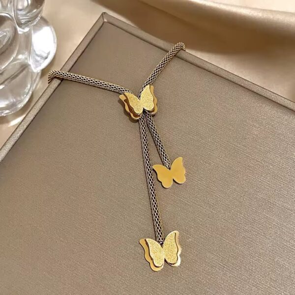 golden butterfly pendant necklace – triple charm adjustable chain | noorah.life