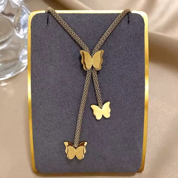 golden butterfly pendant necklace – triple charm adjustable chain | noorah.life